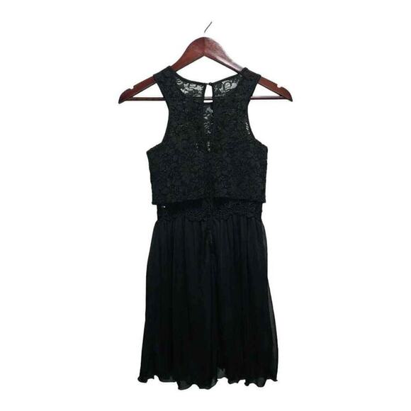 This black sleeveless dress by IN. San Francisco is Size 3 - Picture 2 of 4